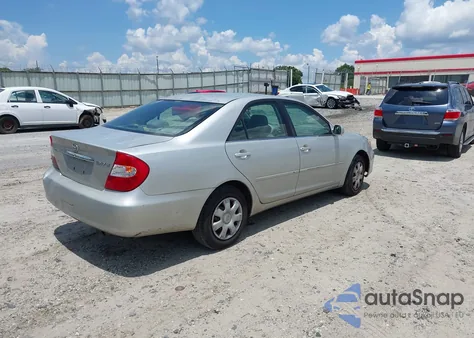 2003 Toyota Camry Le z USA, uszkodzony, nr VIN 4T1BE32KX3U698653